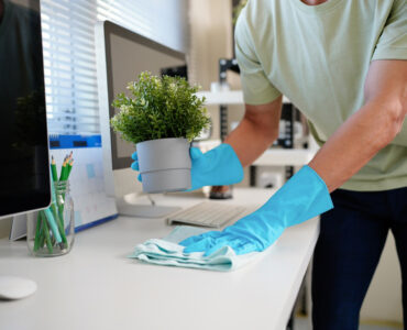 Cleaning woman housewife wash up dishes after dinner in the kitc